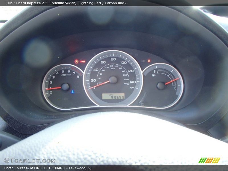 Lightning Red / Carbon Black 2009 Subaru Impreza 2.5i Premium Sedan