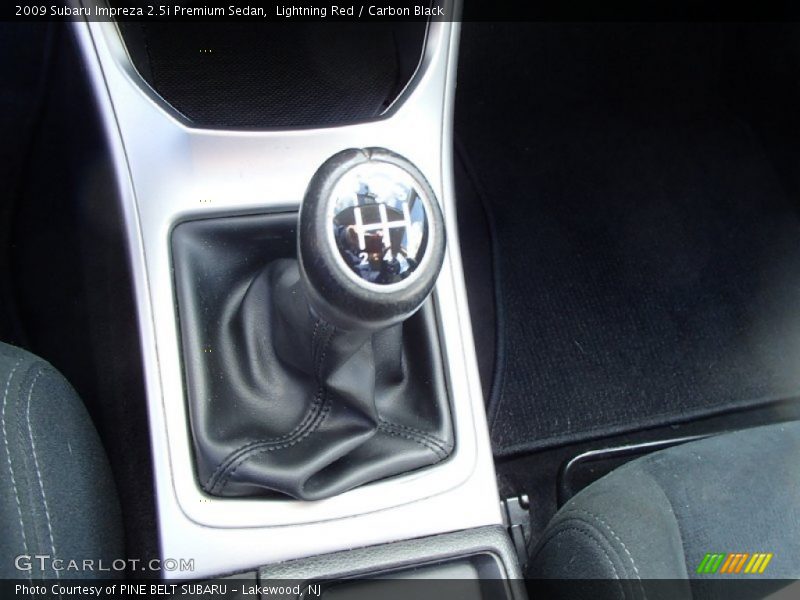 Lightning Red / Carbon Black 2009 Subaru Impreza 2.5i Premium Sedan