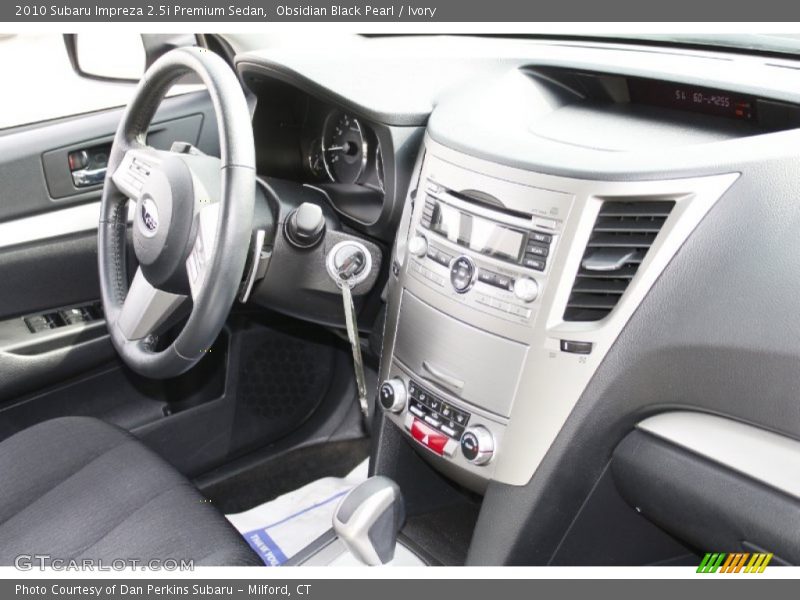 Obsidian Black Pearl / Ivory 2010 Subaru Impreza 2.5i Premium Sedan