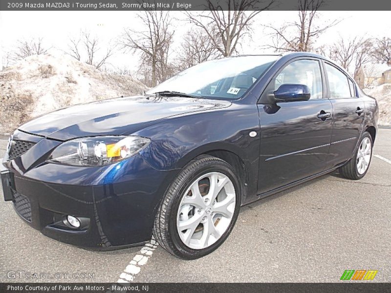 Stormy Blue Mica / Beige 2009 Mazda MAZDA3 i Touring Sedan