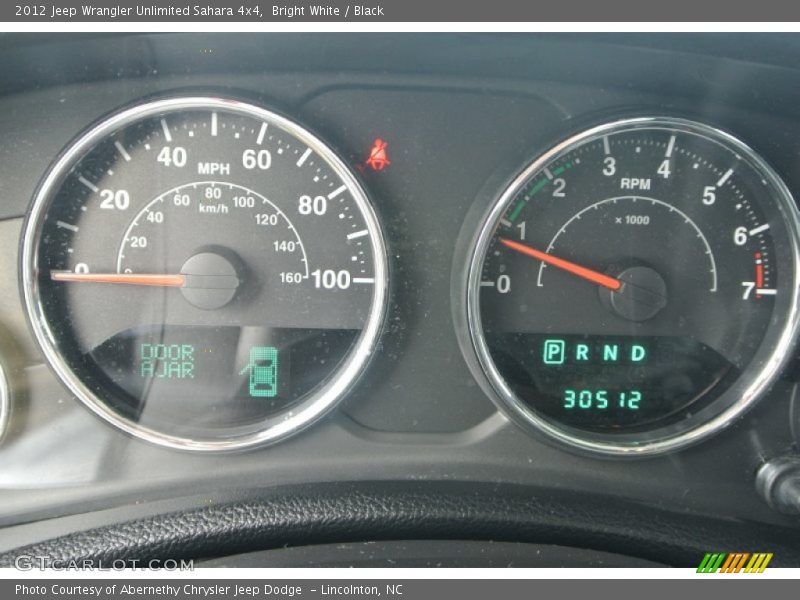 Bright White / Black 2012 Jeep Wrangler Unlimited Sahara 4x4