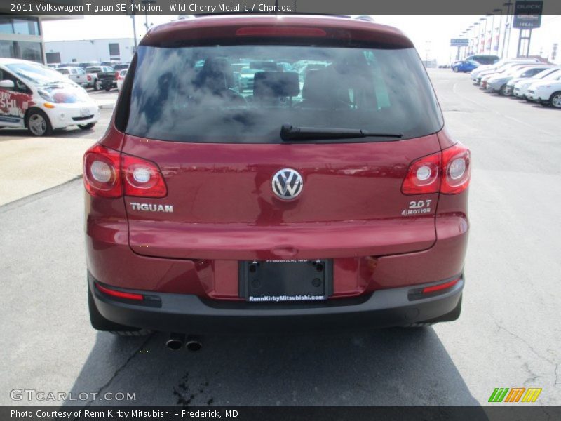 Wild Cherry Metallic / Charcoal 2011 Volkswagen Tiguan SE 4Motion