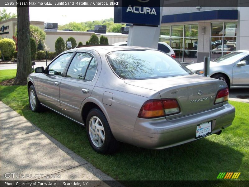 Sunlit Sand Metallic / Charcoal Black 1999 Nissan Maxima GLE