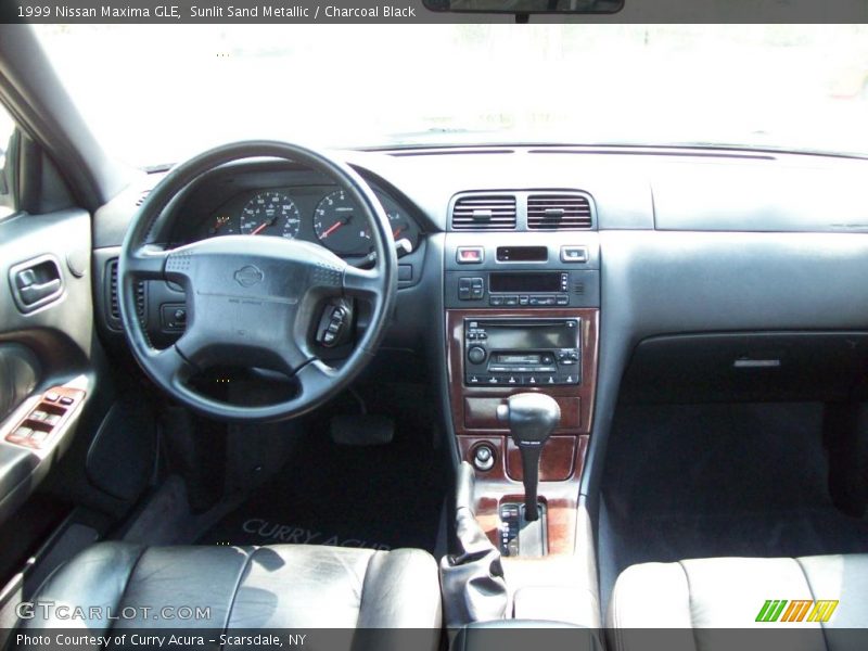 Sunlit Sand Metallic / Charcoal Black 1999 Nissan Maxima GLE