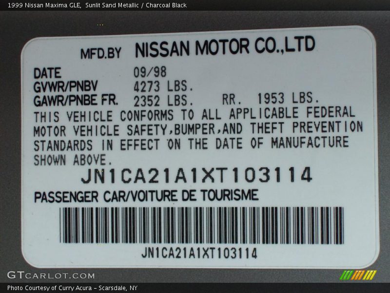 Sunlit Sand Metallic / Charcoal Black 1999 Nissan Maxima GLE