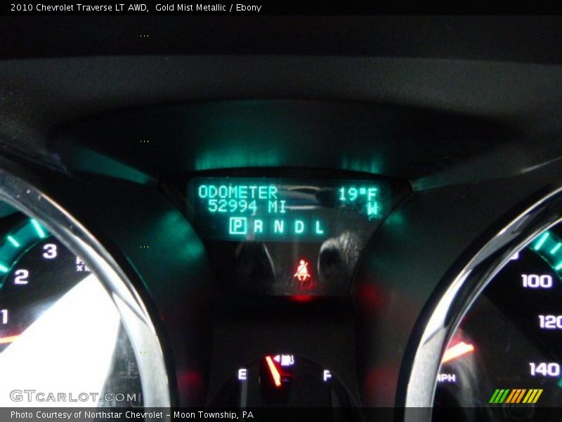 Gold Mist Metallic / Ebony 2010 Chevrolet Traverse LT AWD