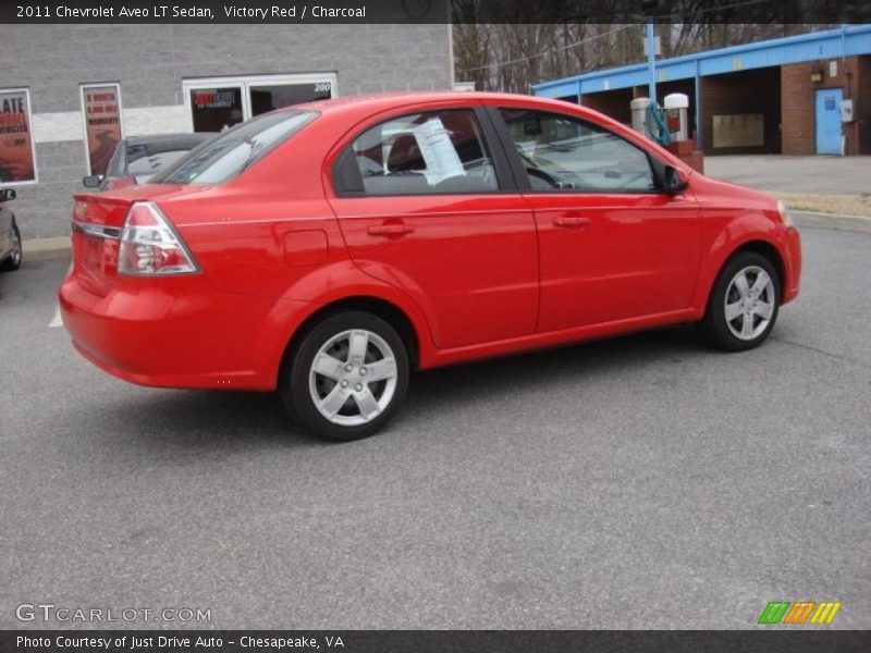 Victory Red / Charcoal 2011 Chevrolet Aveo LT Sedan