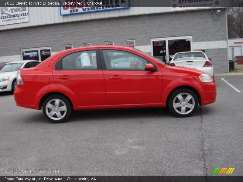 Victory Red / Charcoal 2011 Chevrolet Aveo LT Sedan