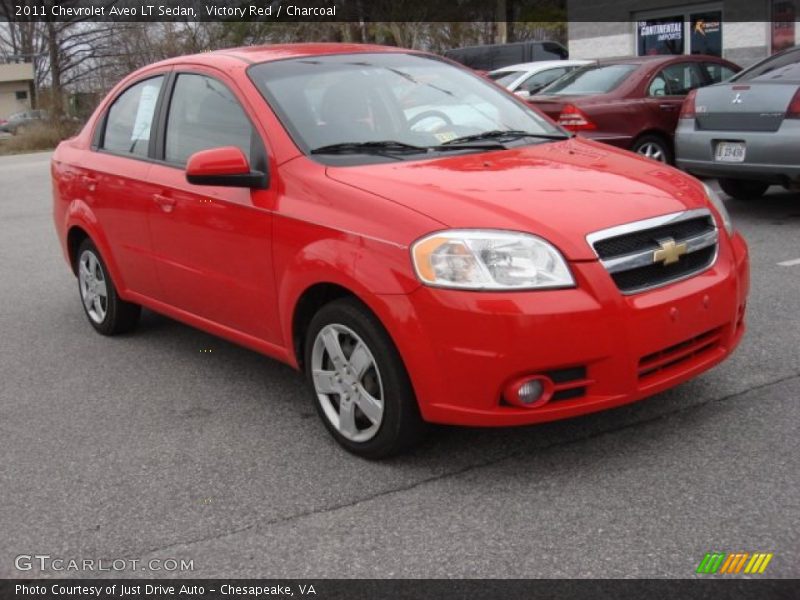 Victory Red / Charcoal 2011 Chevrolet Aveo LT Sedan