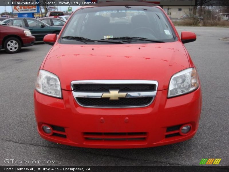 Victory Red / Charcoal 2011 Chevrolet Aveo LT Sedan