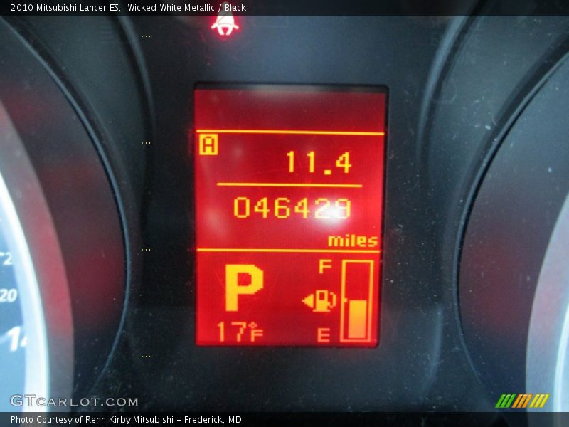 Wicked White Metallic / Black 2010 Mitsubishi Lancer ES