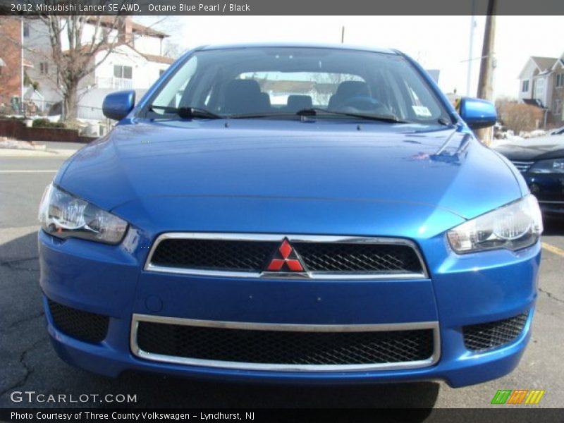 Octane Blue Pearl / Black 2012 Mitsubishi Lancer SE AWD