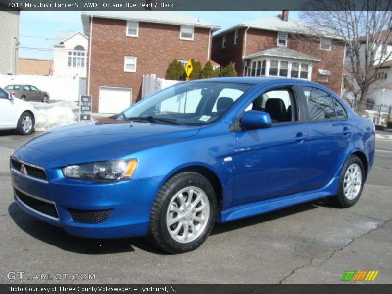 Octane Blue Pearl / Black 2012 Mitsubishi Lancer SE AWD