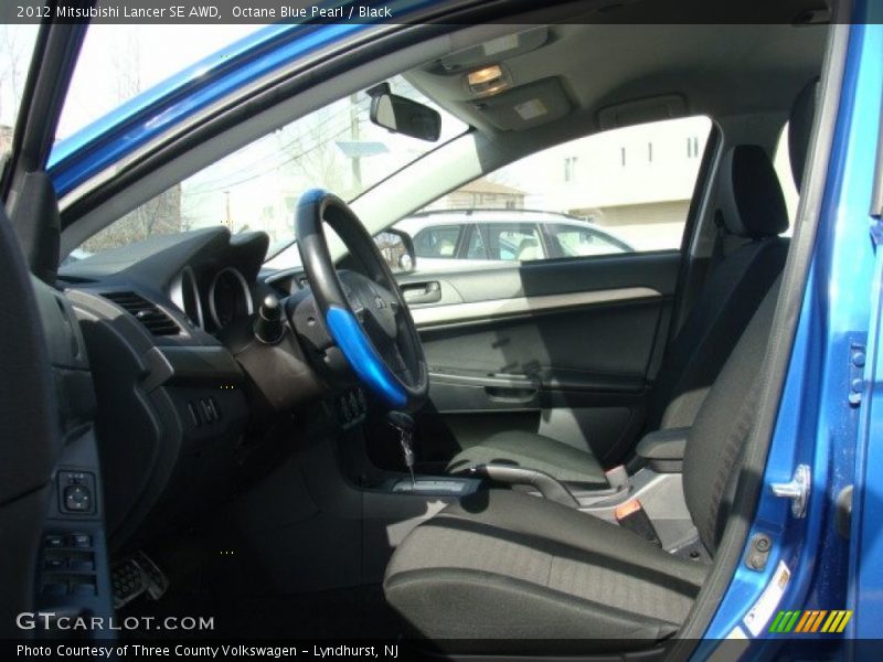 Octane Blue Pearl / Black 2012 Mitsubishi Lancer SE AWD