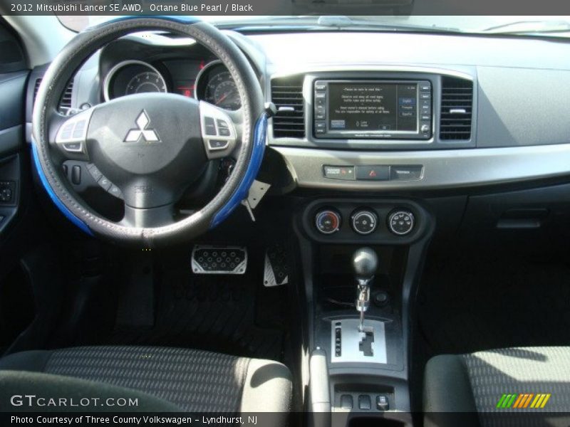 Octane Blue Pearl / Black 2012 Mitsubishi Lancer SE AWD