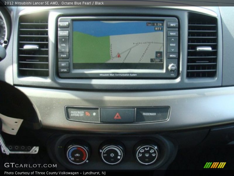 Octane Blue Pearl / Black 2012 Mitsubishi Lancer SE AWD