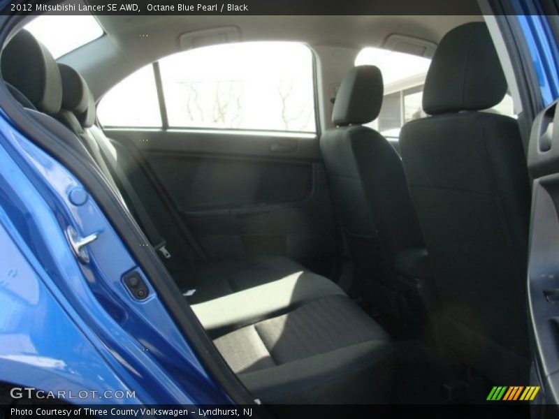 Octane Blue Pearl / Black 2012 Mitsubishi Lancer SE AWD