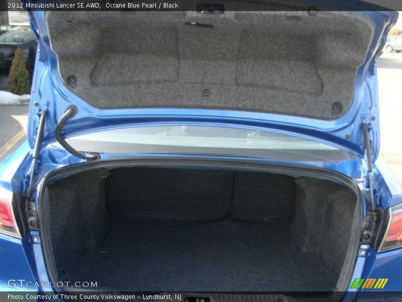 Octane Blue Pearl / Black 2012 Mitsubishi Lancer SE AWD