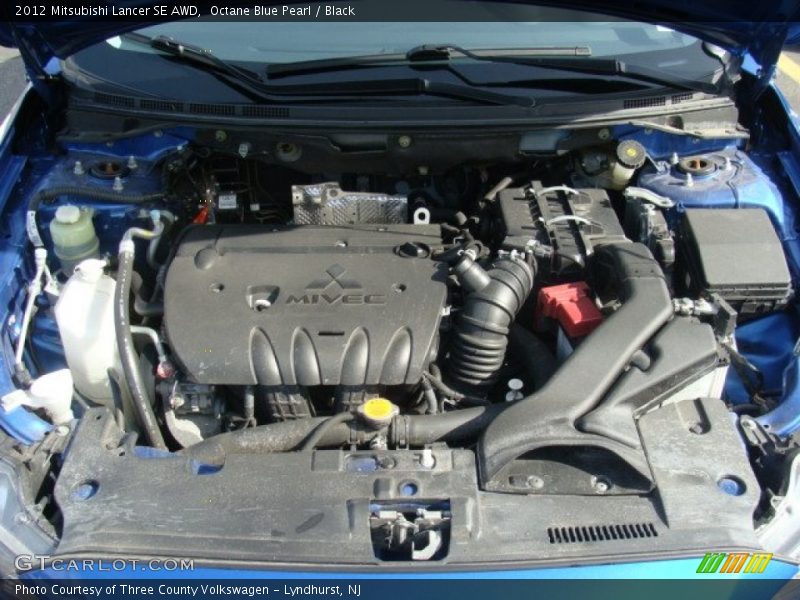 Octane Blue Pearl / Black 2012 Mitsubishi Lancer SE AWD
