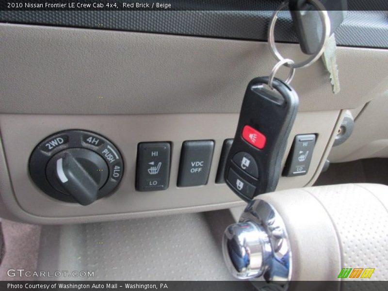 Red Brick / Beige 2010 Nissan Frontier LE Crew Cab 4x4