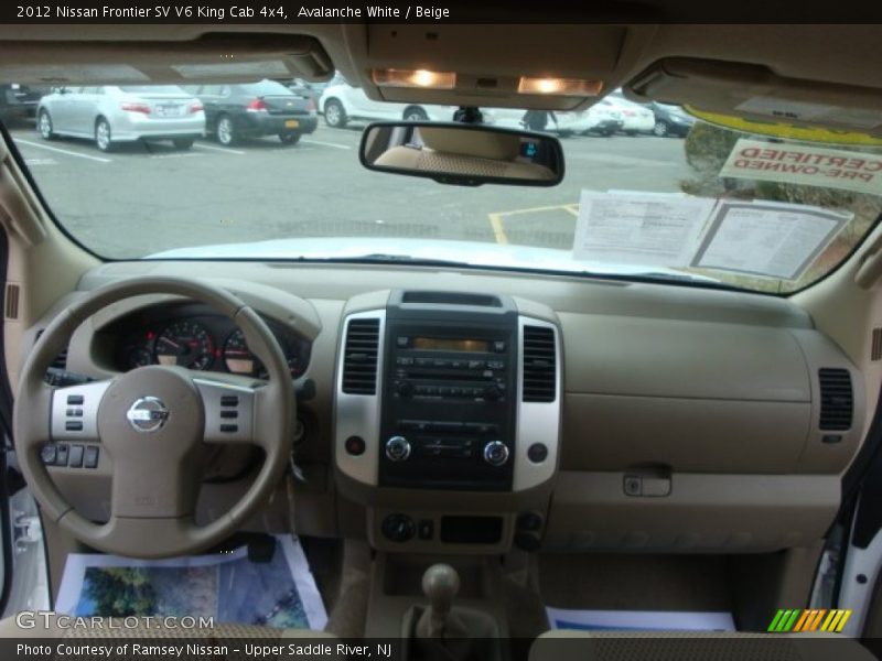 Avalanche White / Beige 2012 Nissan Frontier SV V6 King Cab 4x4