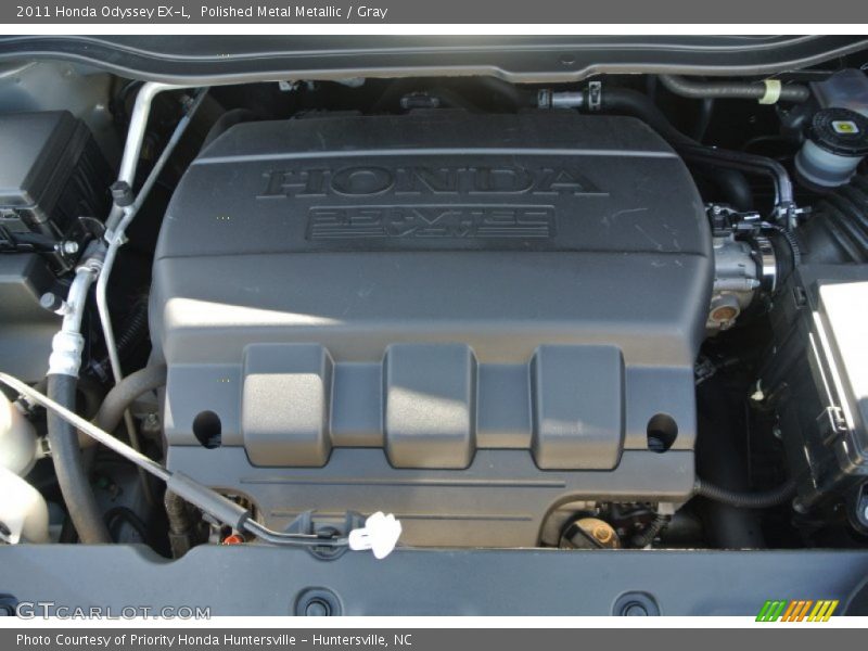 Polished Metal Metallic / Gray 2011 Honda Odyssey EX-L