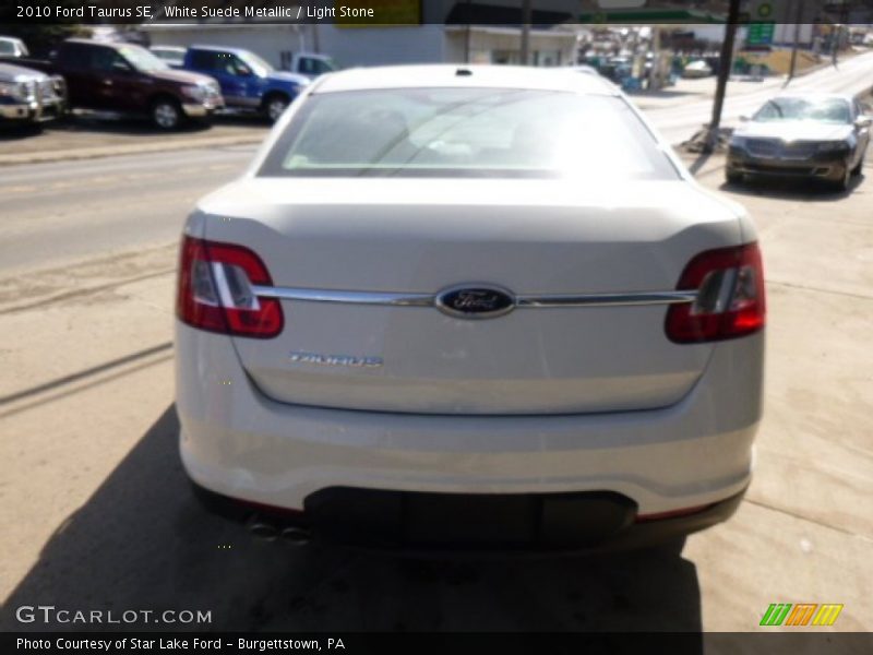 White Suede Metallic / Light Stone 2010 Ford Taurus SE