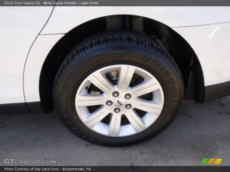 White Suede Metallic / Light Stone 2010 Ford Taurus SE