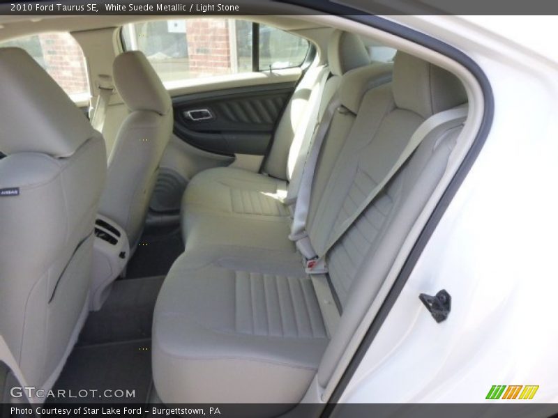 White Suede Metallic / Light Stone 2010 Ford Taurus SE