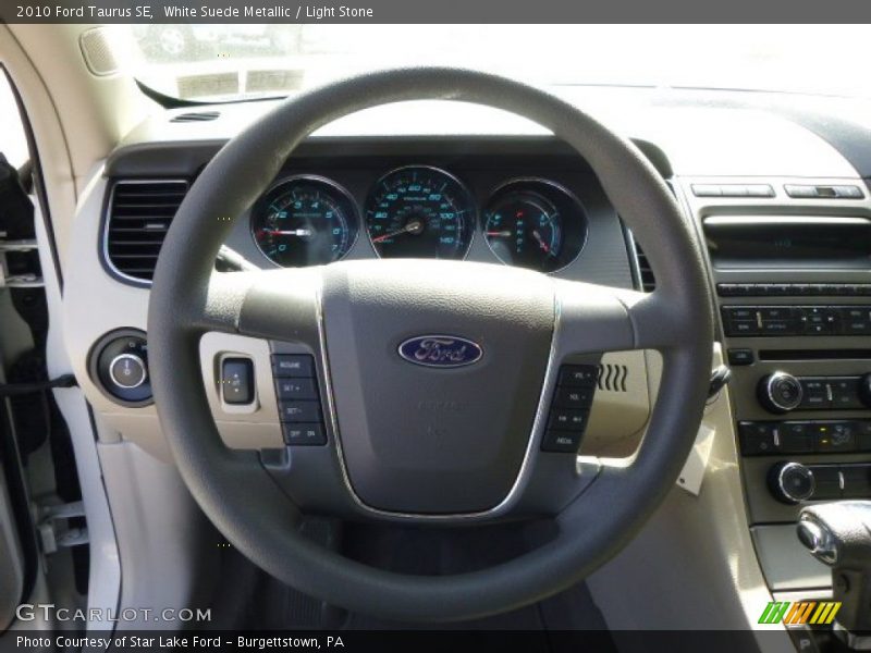 White Suede Metallic / Light Stone 2010 Ford Taurus SE