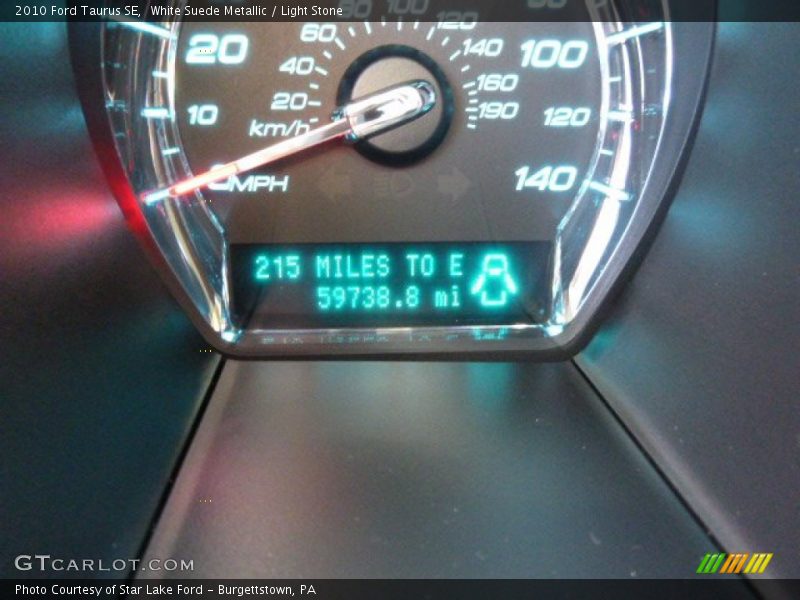 White Suede Metallic / Light Stone 2010 Ford Taurus SE