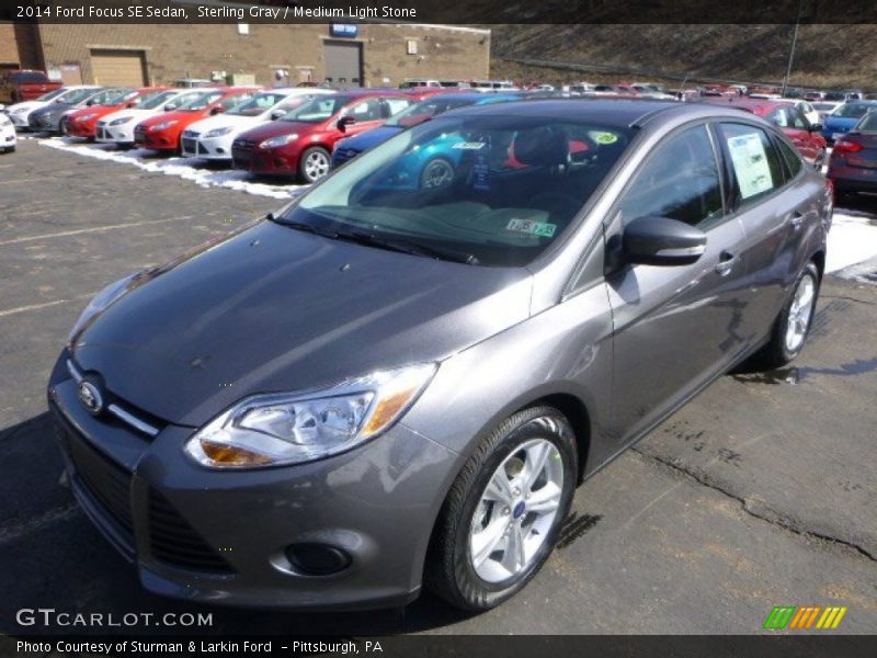 Sterling Gray / Medium Light Stone 2014 Ford Focus SE Sedan