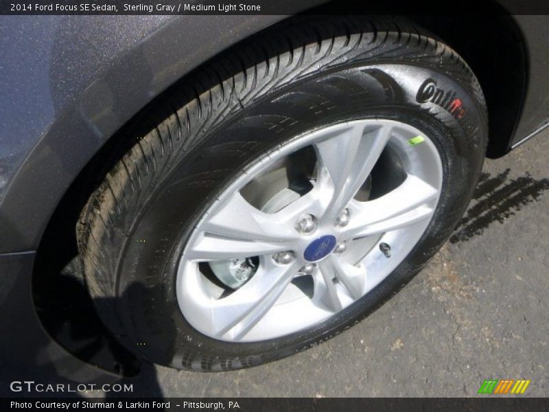 Sterling Gray / Medium Light Stone 2014 Ford Focus SE Sedan