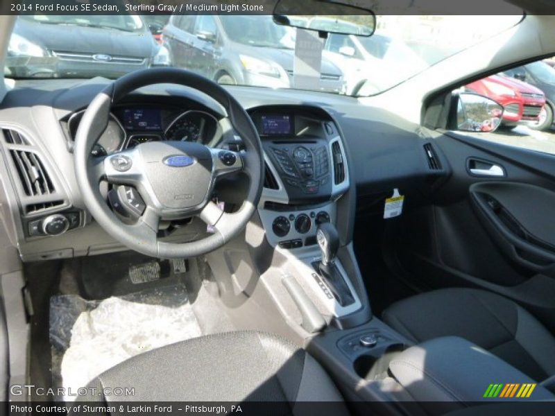 Sterling Gray / Medium Light Stone 2014 Ford Focus SE Sedan