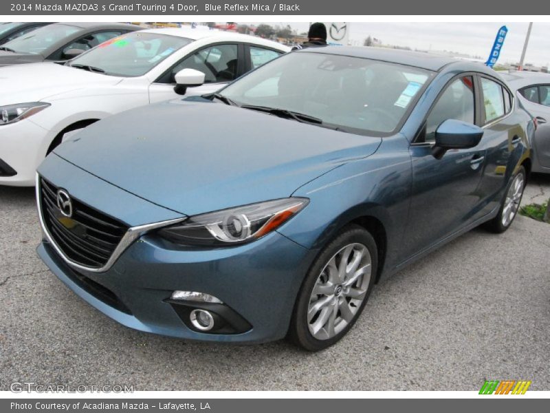 Front 3/4 View of 2014 MAZDA3 s Grand Touring 4 Door