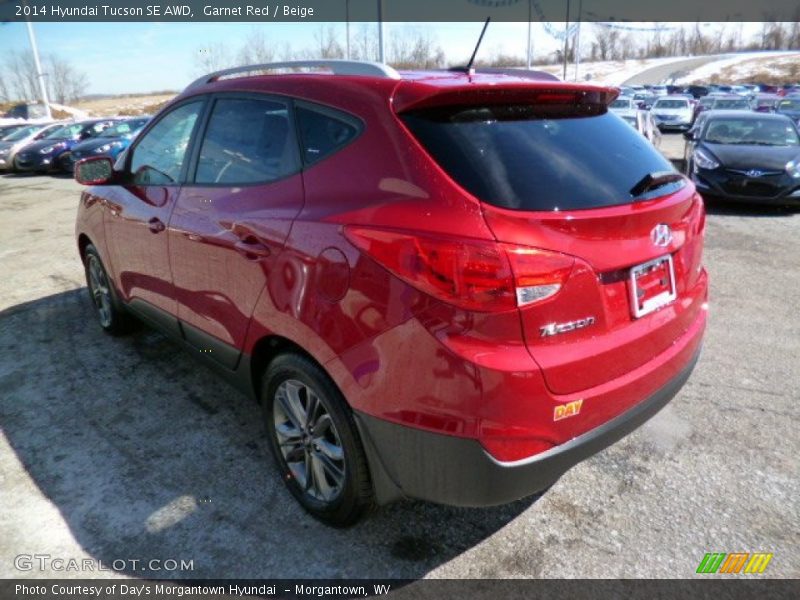 Garnet Red / Beige 2014 Hyundai Tucson SE AWD