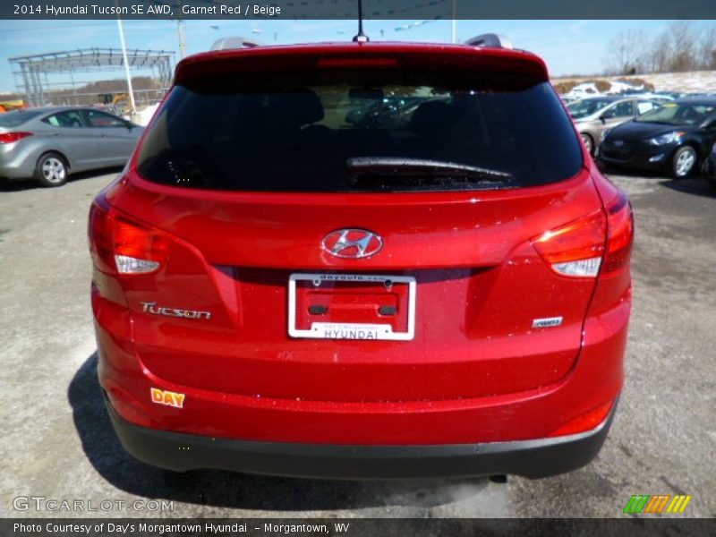 Garnet Red / Beige 2014 Hyundai Tucson SE AWD