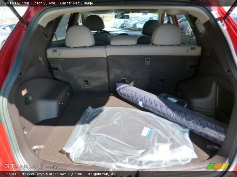 Garnet Red / Beige 2014 Hyundai Tucson SE AWD