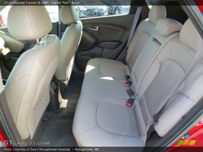 Garnet Red / Beige 2014 Hyundai Tucson SE AWD