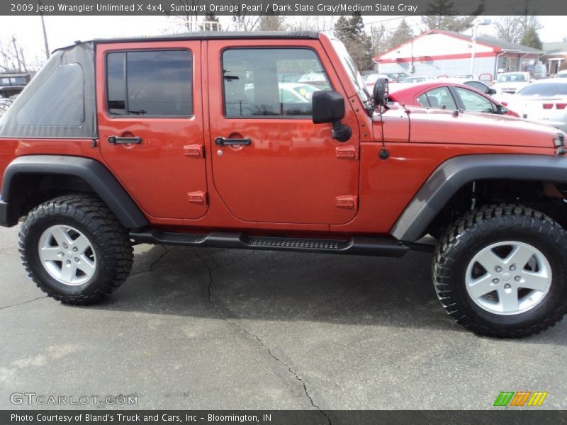 Sunburst Orange Pearl / Dark Slate Gray/Medium Slate Gray 2009 Jeep Wrangler Unlimited X 4x4