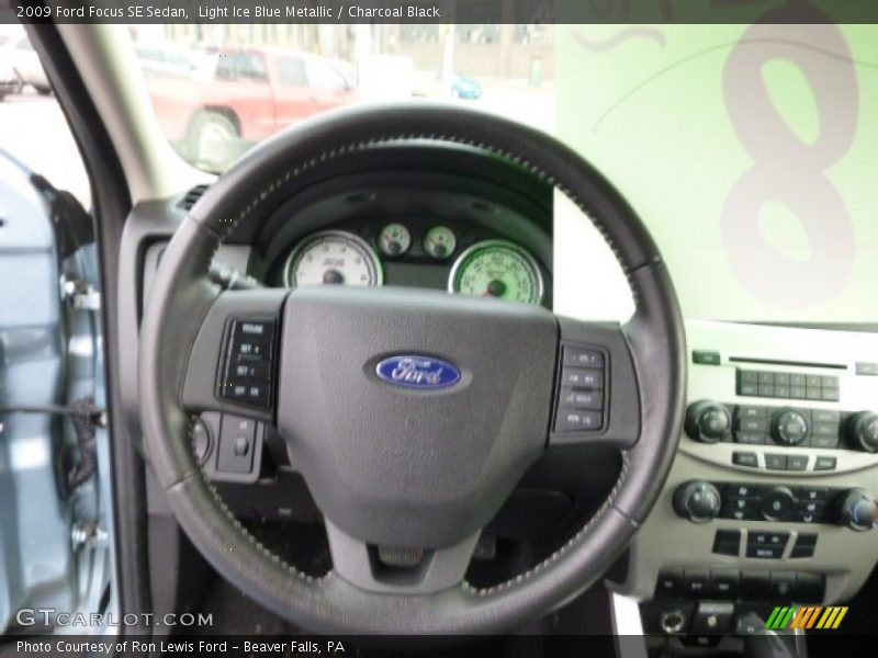 Light Ice Blue Metallic / Charcoal Black 2009 Ford Focus SE Sedan