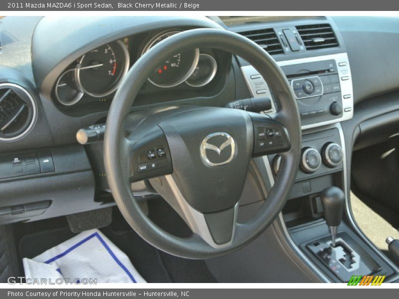 Black Cherry Metallic / Beige 2011 Mazda MAZDA6 i Sport Sedan