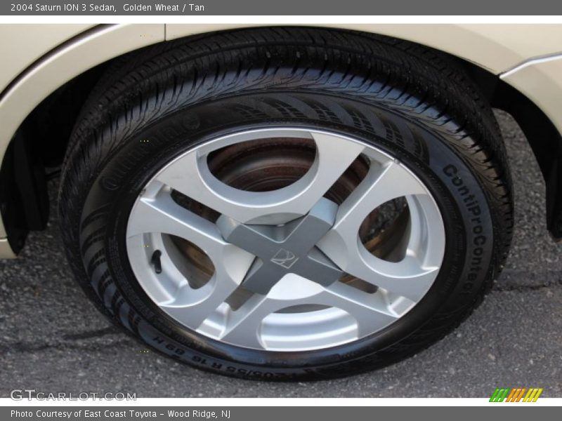 Golden Wheat / Tan 2004 Saturn ION 3 Sedan