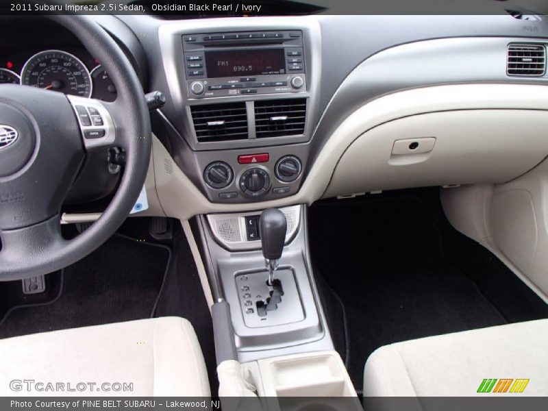 Obsidian Black Pearl / Ivory 2011 Subaru Impreza 2.5i Sedan