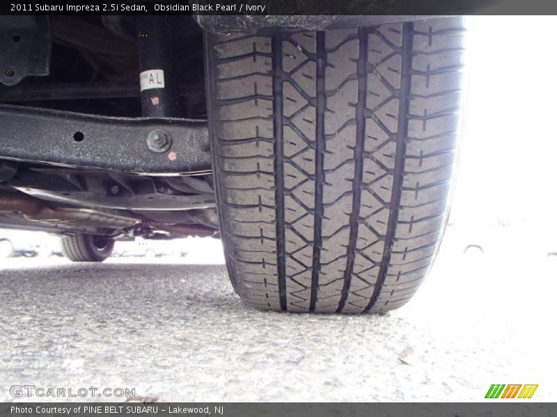 Obsidian Black Pearl / Ivory 2011 Subaru Impreza 2.5i Sedan