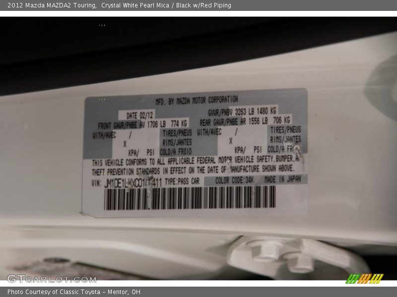 Crystal White Pearl Mica / Black w/Red Piping 2012 Mazda MAZDA2 Touring