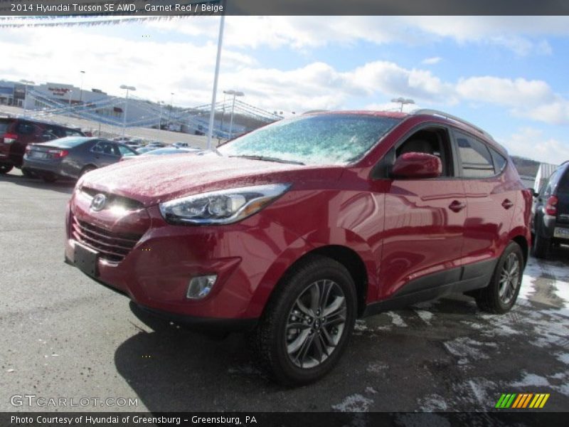 Garnet Red / Beige 2014 Hyundai Tucson SE AWD