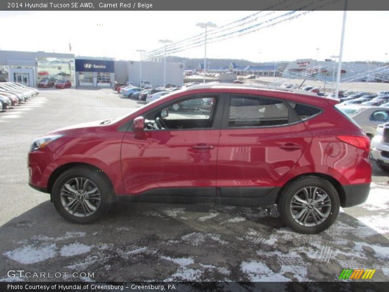 Garnet Red / Beige 2014 Hyundai Tucson SE AWD
