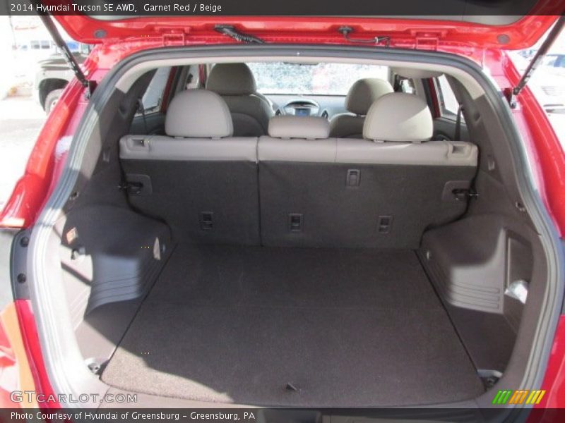 Garnet Red / Beige 2014 Hyundai Tucson SE AWD