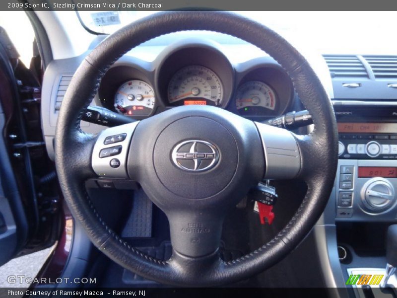 Sizzling Crimson Mica / Dark Charcoal 2009 Scion tC